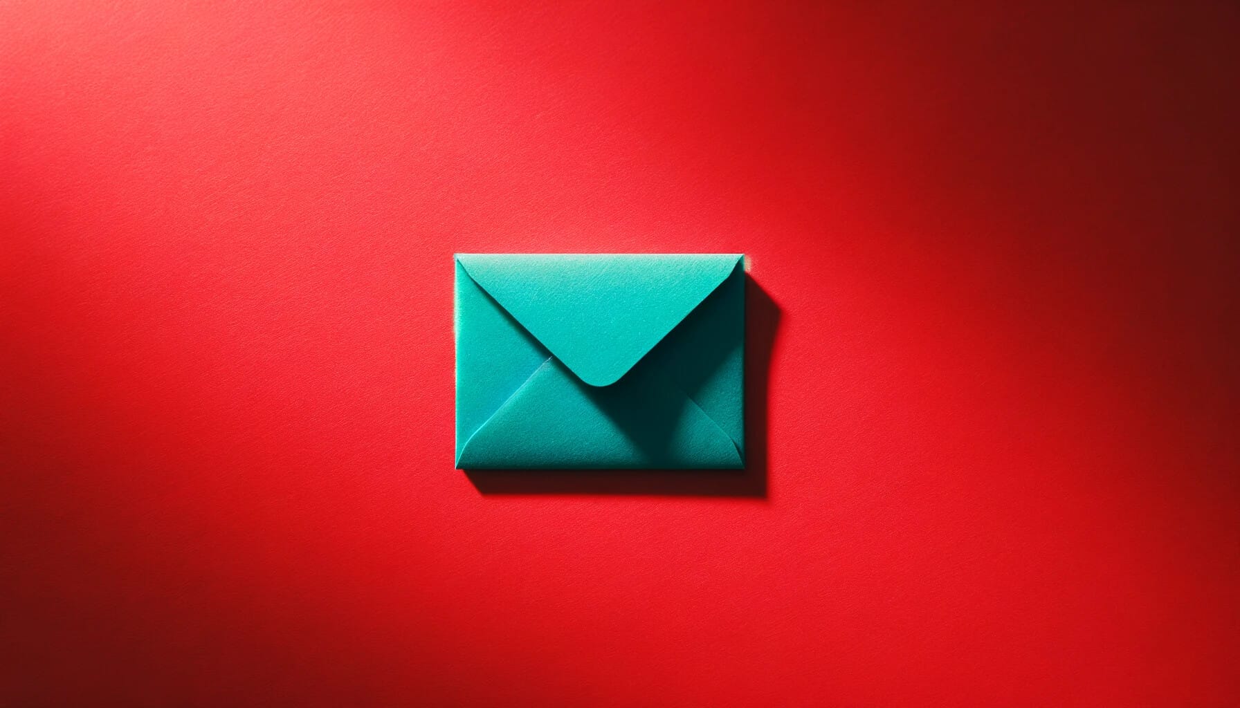 Teal envelope on red background.