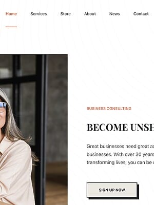 Businesswoman at desk with laptop and juice